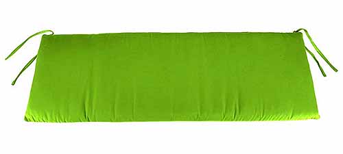 Lime green swing or bench cushion with ties, isolated on a white background.