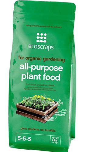 A close up of the packaging of Ecoscraps Organic All-Purpose Plant Food on a white background.