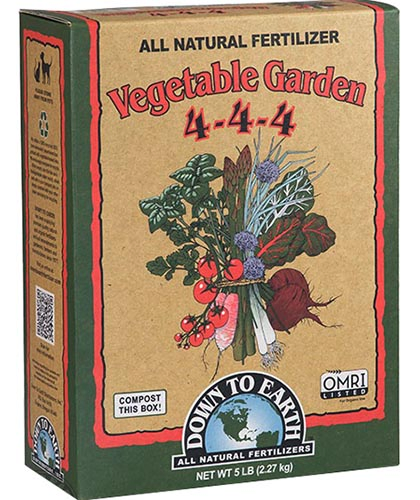 A vertical picture of the packaging of Down to Earth Vegetable Garden All Natural Fertilizer on a white background.