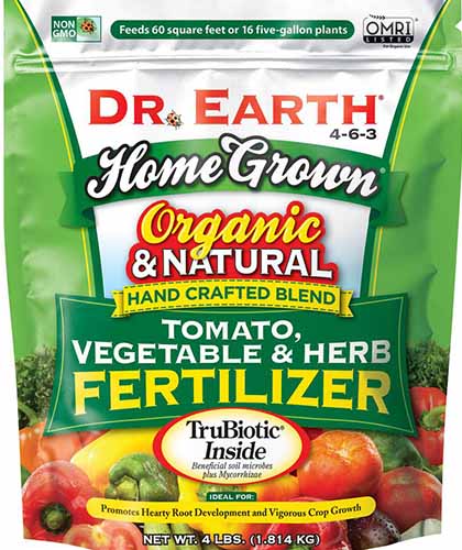 A close up square image of the packaging of Dr Earth Organic and Natural Tomato, Vegetable, and Herb fertilizer.