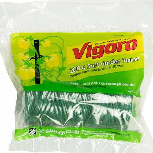 A close up square image of a plastic bag of Vigoro soft garden twine pictured on a white background.