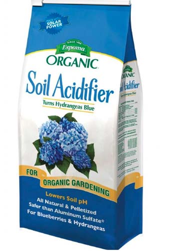 A close up vertical image of the packaging of Espoma Organic Soil Acidifier on a white background.