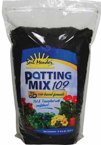 A close up vertical image of the packaging of Soil Mender Potting Mix 109 pictured on a white background.