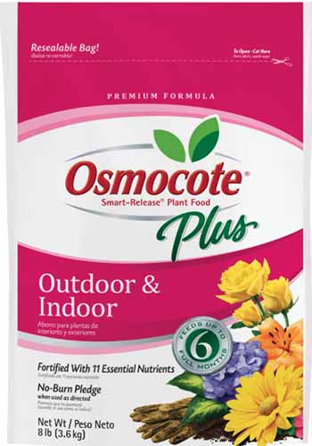 A close up vertical image of the packaging of Osmocote Plus Outdoor and Indoor Fertilizer.