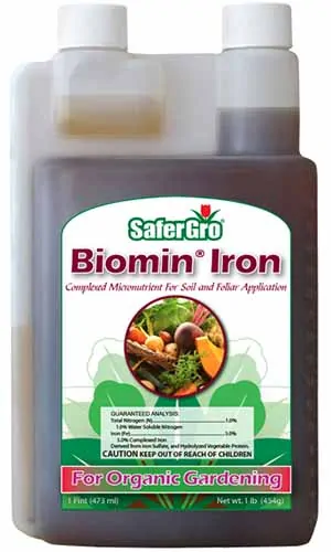 A close up vertical image of the packaging of SaferGro Biomin Iron isolated on a white background.
