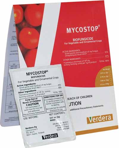 A close up square image of the packaging of Mycostop, a biofungicide for treating plant disease isolated on a white background.
