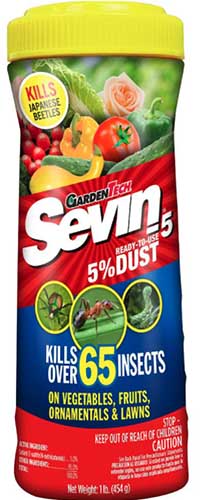 A close up vertical image of the packaging of Garden Tech Sevin Ready to Use Dust isolated on a white background.