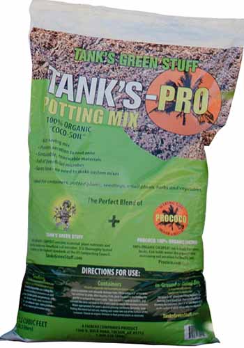 A close up vertical image of a bag of Tank's Pro Potting Mix isolated on a white background.