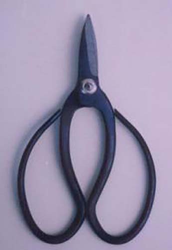 A close up vertical image of a pair of pruning shears isolated on a light purple background.