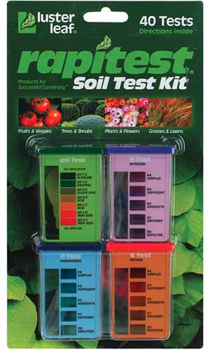 A close up vertical image of the packaging of Luster Leaf Rapitest Soil Test Kit isolated on a white background.