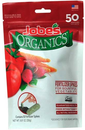 A close up image of a bag of Jobe's Organics Fertilizer Spikes isolated on a white background.