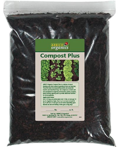 A close up of a bag of Arbico Organics Compost Plus isolated on a white background.