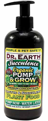 A close up of a pump bottle of Dr Earth Succulence Organic Pump and Grow Plant Food isolated on a white background.
