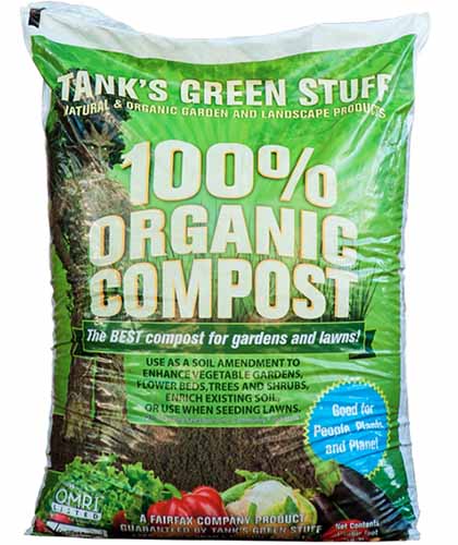 A close up of the packaging of Tank's Green Stuff organic compost isolated on a white background.