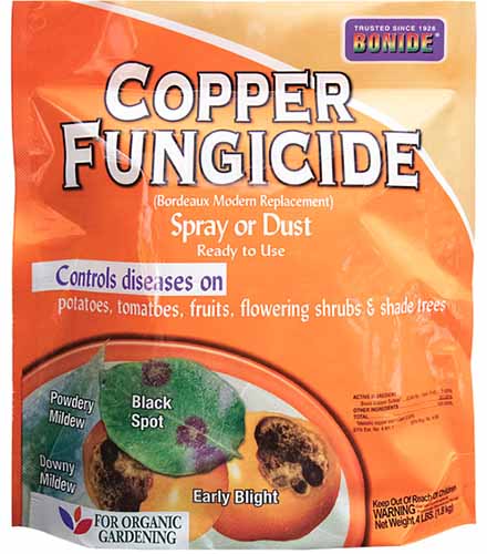 A close up of a package of powdered Bonide Copper Fungicide isolated on a white background.