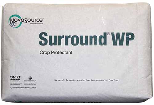 A close up of the packaging of Novasource Surround WP Crop Protectant isolated on a white background.