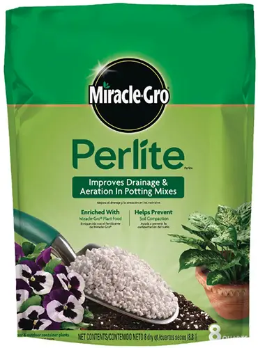 A close up of a bag of Miracle-Gro Perlite isolated on a white background.