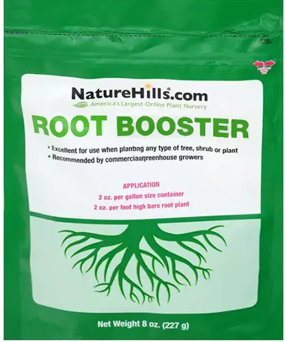 A close up of the packaging of Nature Hills Root Booster isolated on a white background.