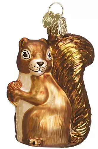 A close up of a glass squirrel ornament isolated on a white background.