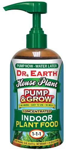 A close up of a bottle of Dr Earth Pump and Grow Concentrated Indoor Plant Food isolated on a white background.