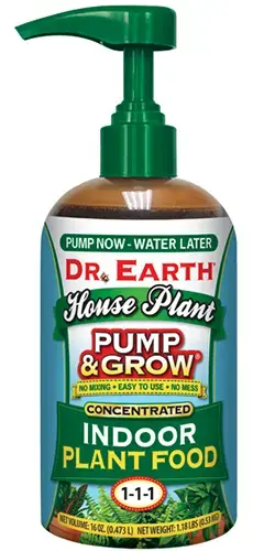 A close up of a bottle of Dr Earth Pump and Grow Fertilizer isolated on a white background.