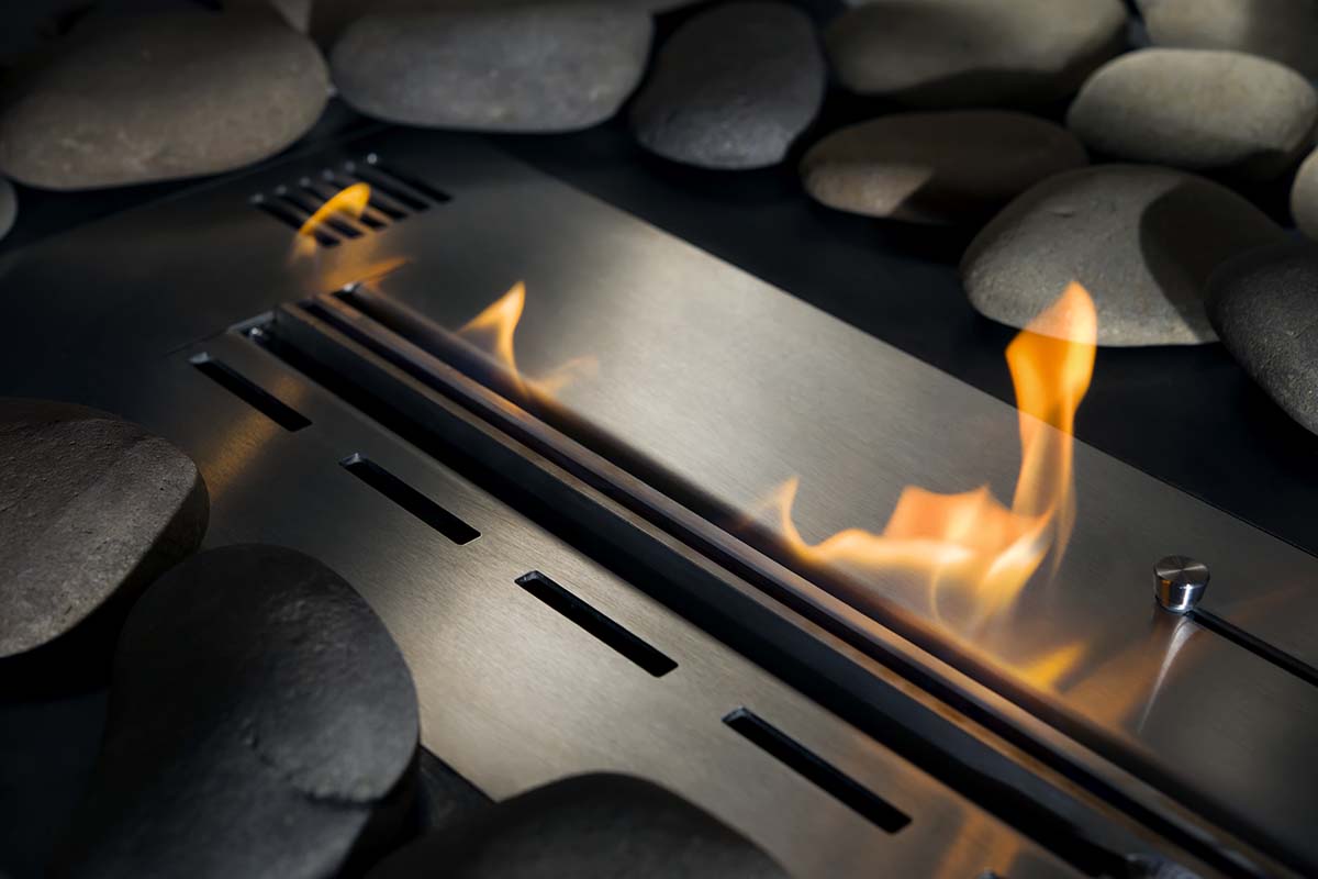 A close up horizontal image of the flames produced by ethanol.