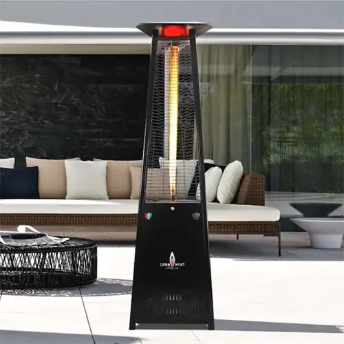 A square image of a Lava Heat Italia Lavalite patio heater with a residence and outdoor furniture in the background.