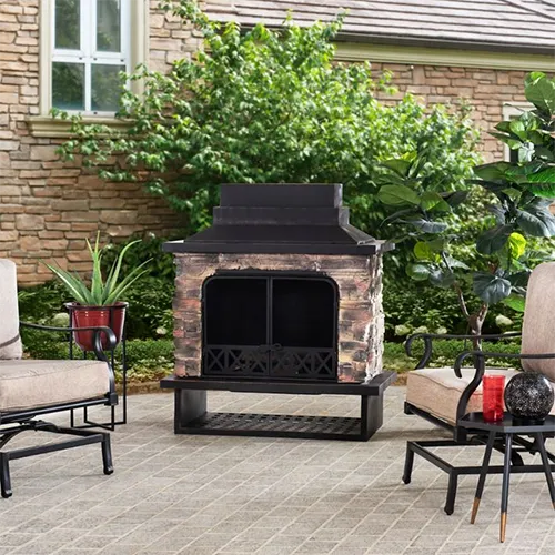A square image of an outdoor seating area with a Sunjoy Canyon Wood Burning Fireplace.