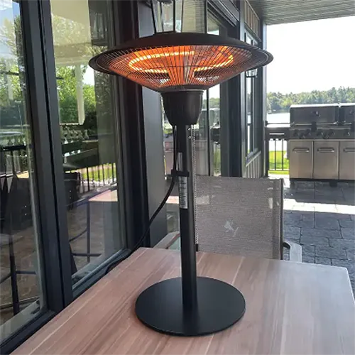 A square image of a Westinghouse infra red heater on an outdoor table.