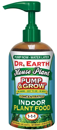 A close up of a bottle of Dr Earth Pump and Grow Houseplant Fertilizer isolated on a white background.