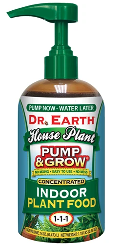 A close up of a bottle of Dr Earth Pump and Grow Indoor Plant Food isolated on a white background.