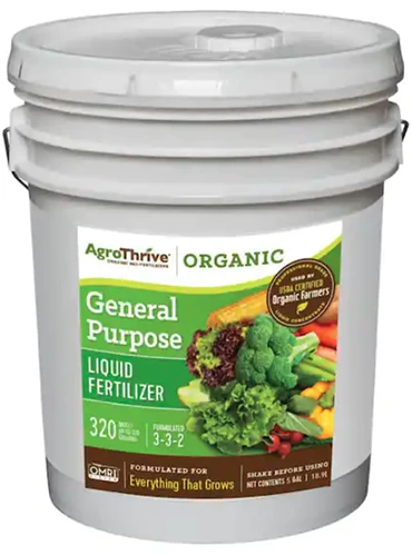 A close up of a tub of AgroThrive general purpose liquid fertilizer isolated on a white background.