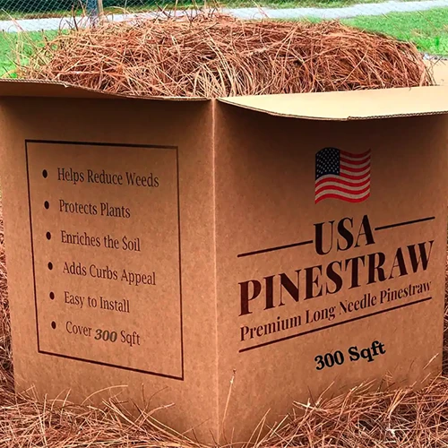 A close up of a box of USA pinestraw mulch.