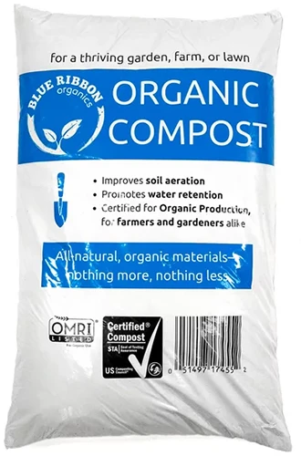 A close up of a bag of organic compost isolated on a white background.