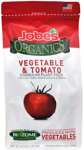 A close up of the packaging of Jobe's Organic Granular Fertilizer isolated on a white background.