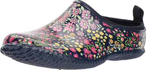 A close up of a Western Chief Women's Garden clog in floral design isolated on a white background.