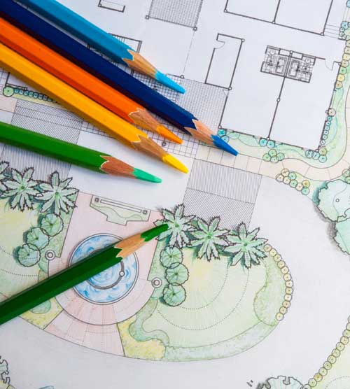 A landscape plan sketched out on paper with colored pencils.
