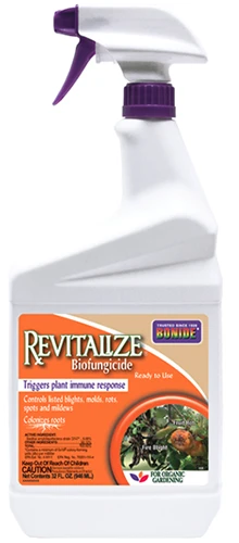 A close up of a bottle of Bonide Revitalize Biofungicide isolated on a white background.