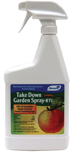 A close up of a bottle of Monterey Take Down Garden Spray isolated on a white background.