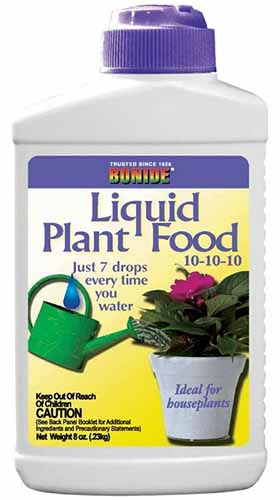 A vertical image of a purple and white bottle of Bonide's 10-10-10 Liquid Plant Food.
