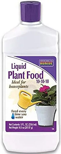 A vertical image of a white and purple bottle of Bonide's 10-10-10 liquid plant food in front of a white background.