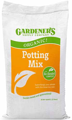 A close up of a bag of Gardener's Supply Company Organic Potting Mix isolated on a white background.