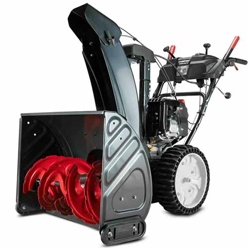 A close up square image of the black and red Troy-Bilt Storm 2665 unit on a white background.
