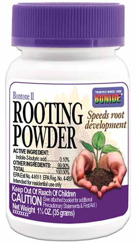 A vertical image of a purple and white bottle of Bonide's IBA rooting powder.