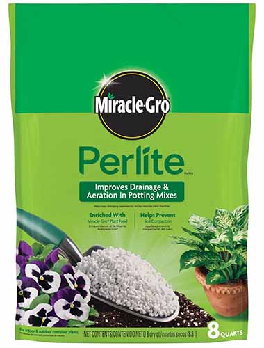 A close up of a bag of Miracle-Gro isolated on a white background.