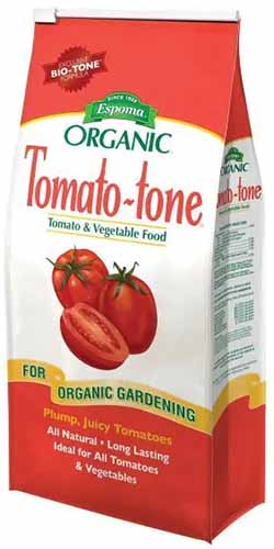 A vertical product photo of a bag of Espoma Tomato Tone.