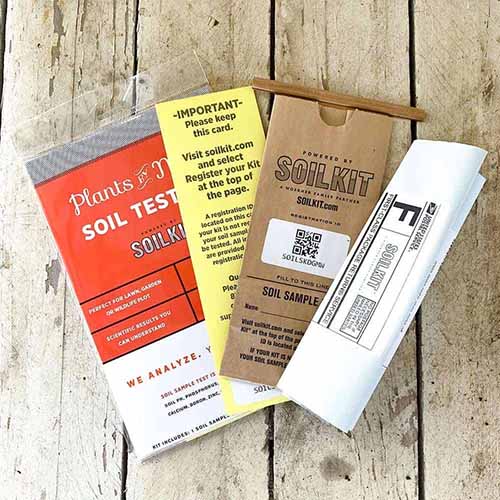 A square product photo of several packets from a soil test kit.