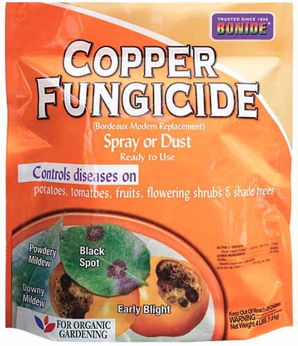 A close up of a bag of Bonide Copper Fungicide isolated on a white background.