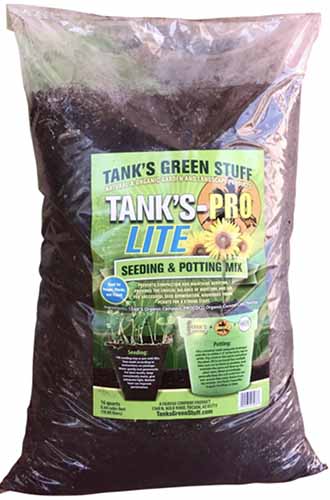 A close up of a bag of Tank's-Pro Lite seeding and potting mix isolated on a white background.