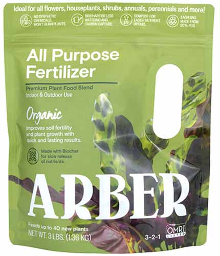 A close up of a bag of Arber All Purpose Fertilizer isolated on a white background.